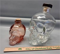 Glass skeleton head bottles with corks