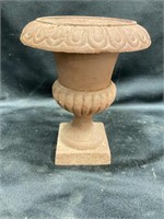 Cast iron urn. 5 inches tall 4 inches in diameter