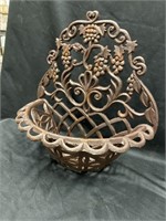 Cast-iron wall planter with grape  design. 14