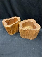 Two freestyle hand carved planters. Each about 7