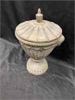 Cast iron urn. 12 inches tall 7 inches in