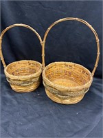 Pair of handled baskets. Big one is 8 inches in
