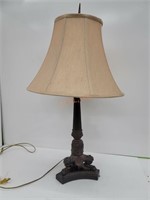 Ornate claw foot resin table lamp with dimmer