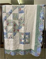 Patchwork Quilt with Scalloped Edge