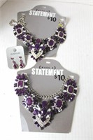 two large purple statement necklaces ,, pair of pu