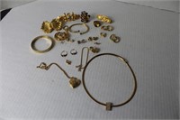 large misc lot of gold jelwery and hair peices