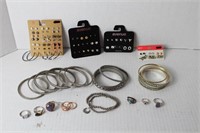 misc lot of earrings , braclets , rings