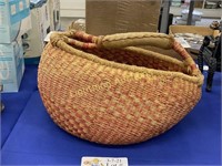 18 POLISHED STONE FRUITS IN WOVEN BASKET
