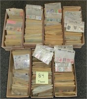 B4- 7 shoe boxes full of sorted foreign stamps i