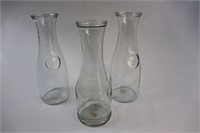 Three (3) glass carafes