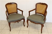 Two wooden chairs, green upholstery