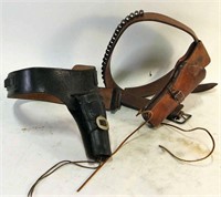 TWO VINTAGE LEATHER REVOLVER HOLSTERS