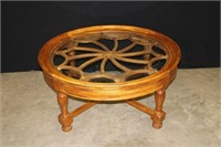 Round glass top coffee table