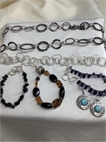 Large lot of jewelry, earrings. 3 bracelets and 2