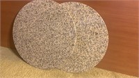 Pair of granite round pieces and plywood