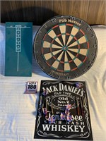 Dart board and Jack Daniels sign