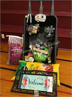 WHEEL BARROW FILLED WITH GARDEN ITEMS