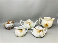 antique tea pots & cream & sugar set
