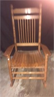 Oak wood rocking chair.