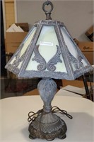 Antique cast metal slag glass lamp