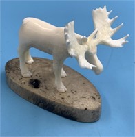 Stunning ivory carving of a bull moose by Leonard