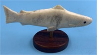 Moose antler carving of a salmon on a wood base ab