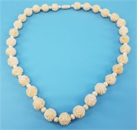Nicely carved bone beaded necklace about 20" long