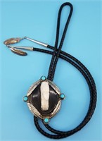 Beautiful sterling silver bolo tie with centerpiec
