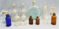 assortment of glass bottles                     (O