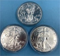 3 Uncirculated silver eagles:  2016, 2014, 2011