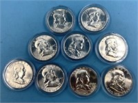 Nine 1956 Franklin silver half dollars, all uncirc