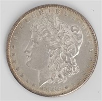 Coin 1885-S Morgan Silver Dollar In Choice AU+