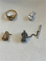 Two Tie Tacks, Ring, and Pendant