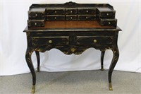 Black and gold writing desk