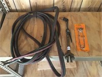 Cutting torch, hose, and striker