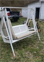 White porch swing this is a heavy plastic swing