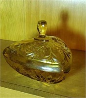 Lovely light amber colored candy dish has a tiny