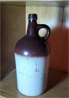 Glass jug would be great for your moonshine approx
