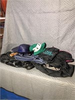 Quantity of duffel bags, two hats. Comes in tote