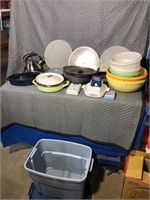 Assortment of Tupperware, kettle, frying pans,