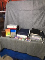 Qty of binders, photo albums, the new Websters