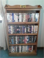 Oak book case w/ VHS tapes