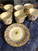 Set of 9 Antique eggs cups with 3 saucers