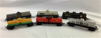 Six plastic tanker cars for trains set