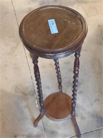 Wooden plant stand with spiral legs