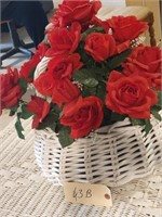 White wicker basket floral arrangement w/red roses