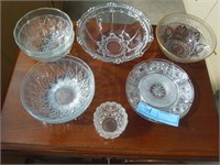 Assorted glass bowls, saucers and candle holder