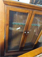 Gun cabinet w/glass doors and storage underneath