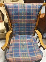 Wooden rocker with plaid cushions