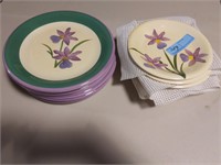 Plates and saucers with purple flower designs